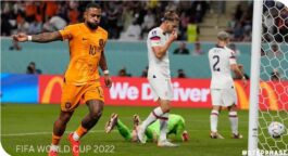 Memphis Depay celebrates after scoring the opening goal of his team during the World Cup round of 16 match between the Netherlands and the United States, at the Khalifa International Stadium in Doha, Qatar, Saturday, Dec. 3, 2022. (AP Photo/Martin Meissner)