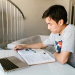 student laptop studying AI technology