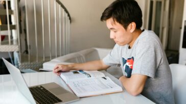 student laptop studying AI technology