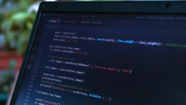 coding AI assistant laptop screen
