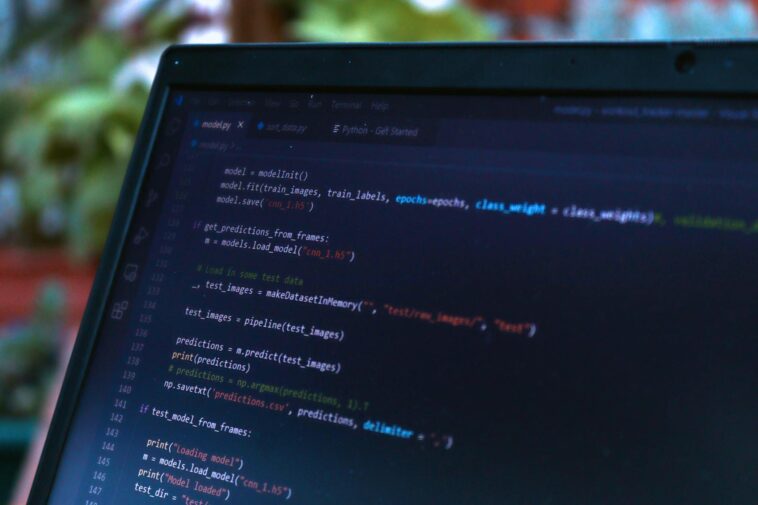 coding AI assistant laptop screen