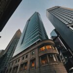 Stunning view of Hong Kong Island skyscrapers at dusk with a low-angle perspective.