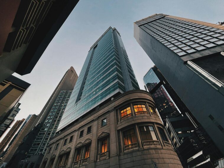Stunning view of Hong Kong Island skyscrapers at dusk with a low-angle perspective.