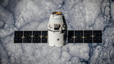 SpaceX Dragon spacecraft in orbit, highlighting advanced space technology with cloud backdrop.